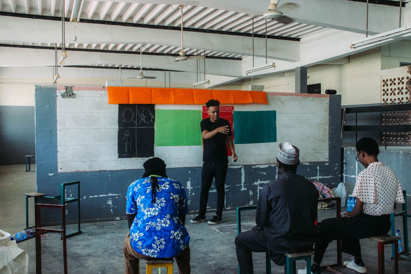A facilitator leading an interactive workshop in Nigeria